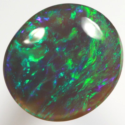 SOLID BLACK OPAL Bright gemmy fire in a Green Harlequin pattern SEE VIDEO